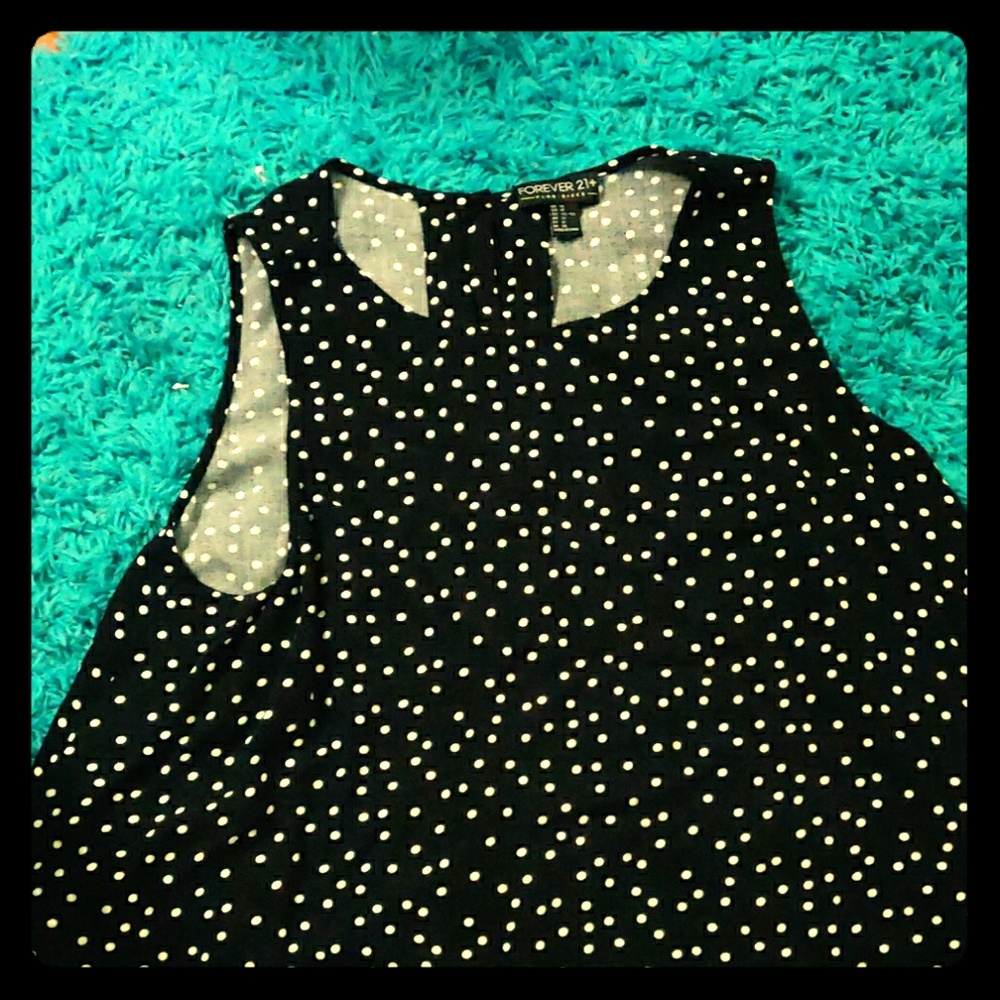 A black and white polka dot blouse